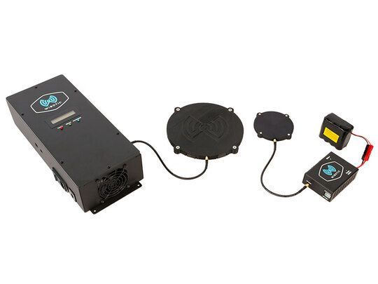 Wireless charging system for drones with inductive charging pad and connected power supply
